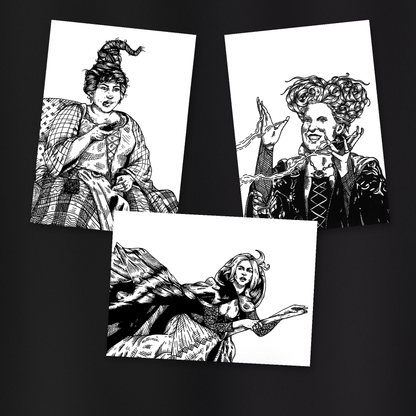 Sanderson Sisters print set — original Sarah, Mary, and Winnie artwork tilted and overlapping on a charcoal gray background